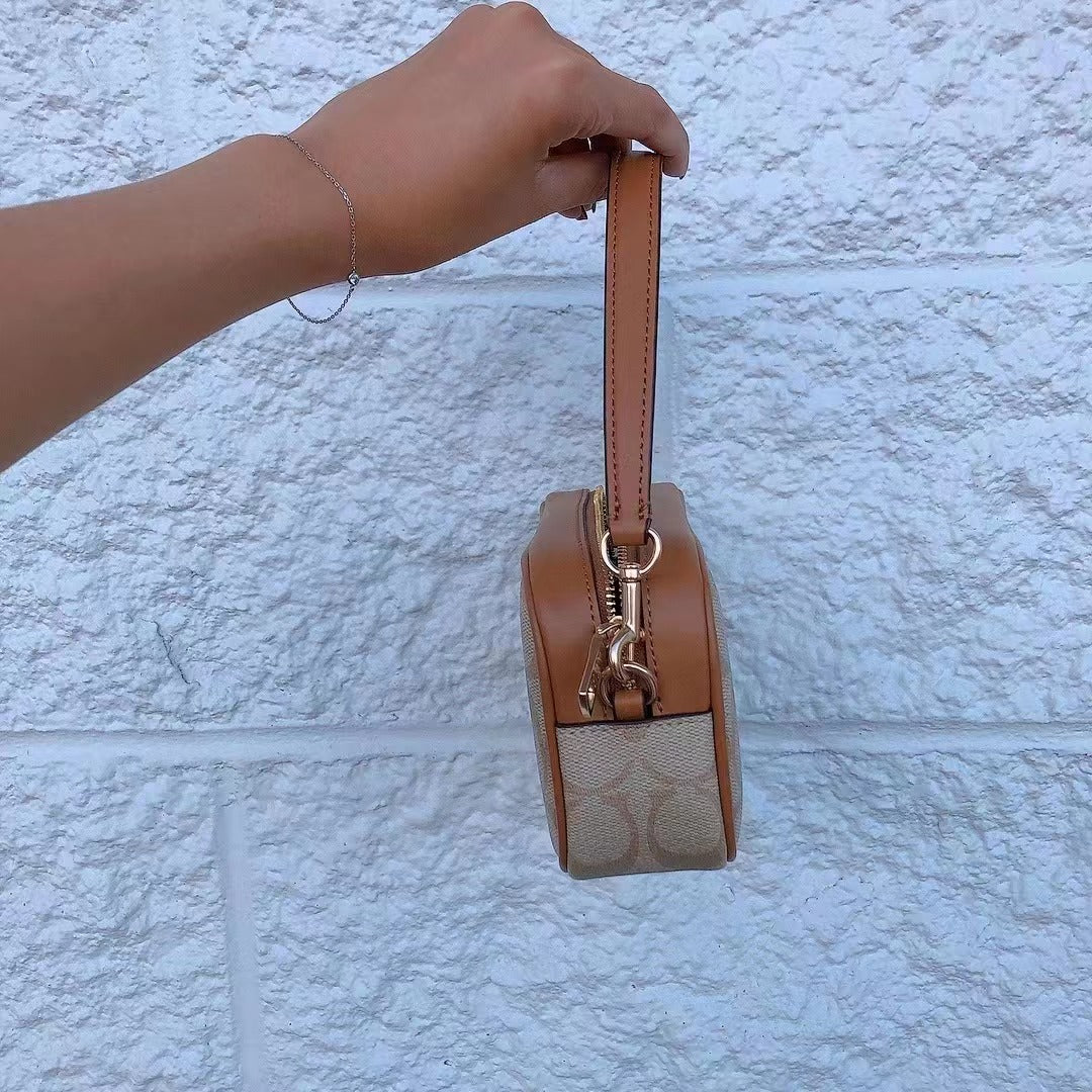 Coach CA718 Jamie Wristlet In Signature Canvas In Gold/Lt Khaki/Lt Saddle Coach CA718 Jamie Wristlet In Signature Canvas In Gold/Lt Khaki/Lt Saddle